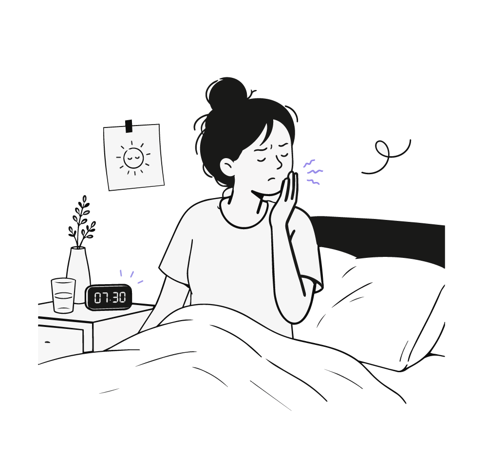 Frau mit morgendlichen Kieferschmerzen